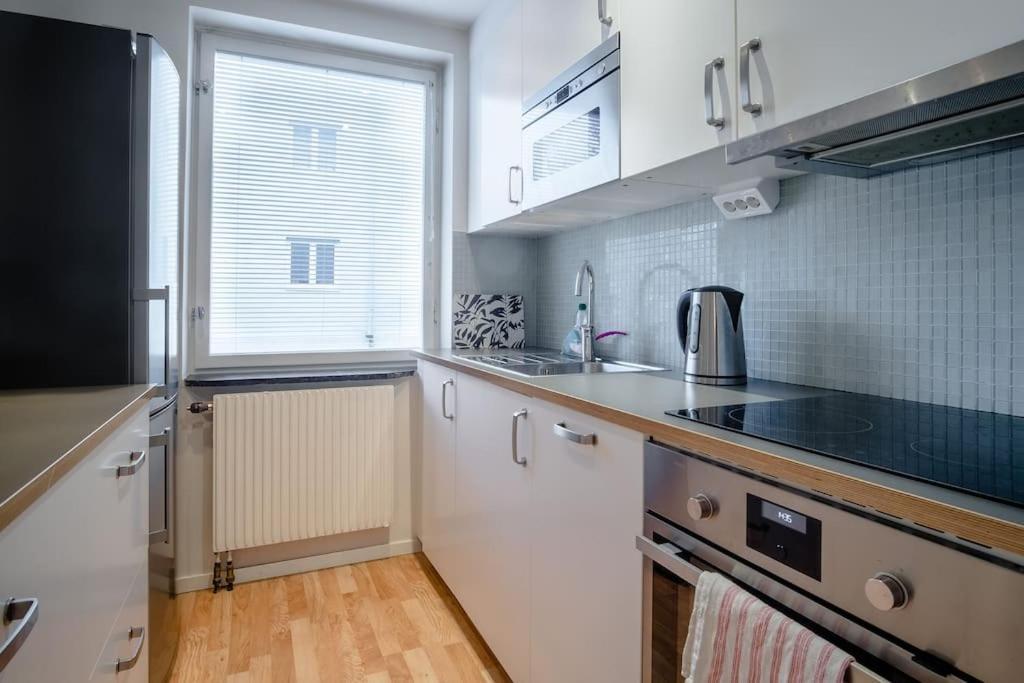 Stockholm Checkin Apartment Alvik Bagian luar foto
